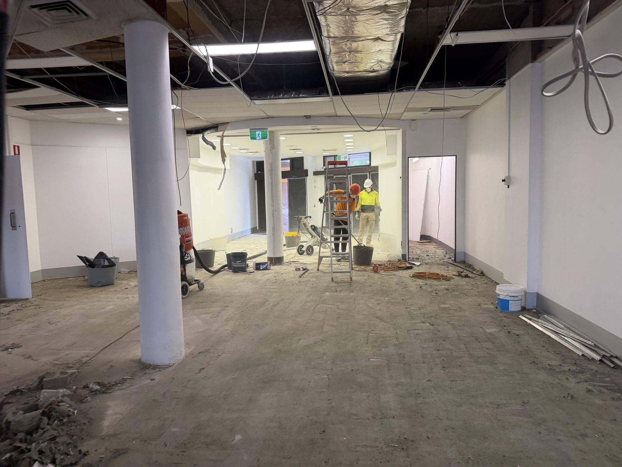 Commercial interior stripped back to slab and soffit during asbestos removal works