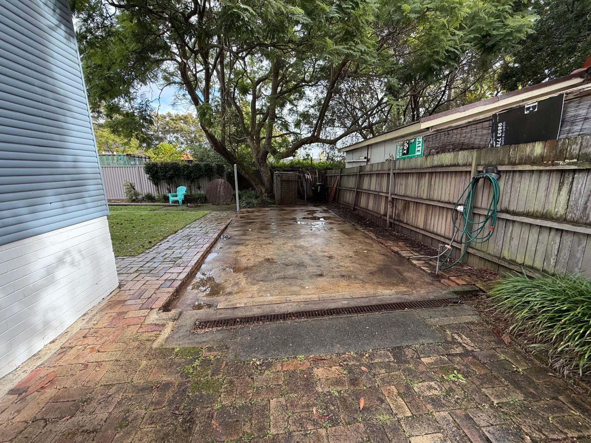 The garage slab washed down and cleared after the licensed demolition