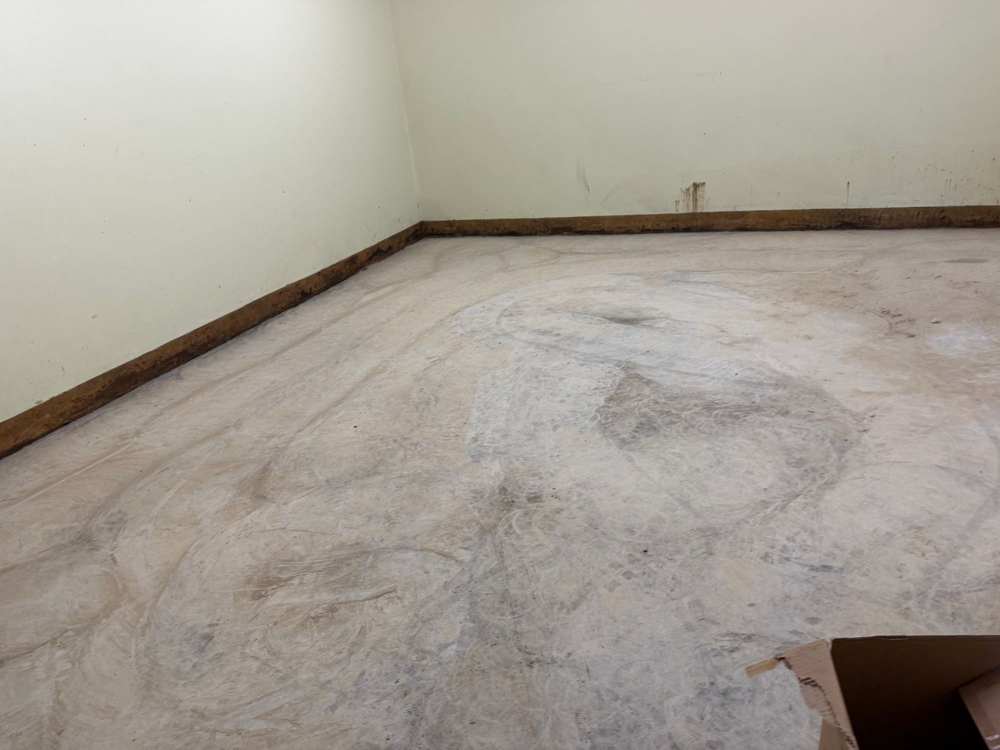 The same Gladesville gym defit with the floor ground back to clean bare concrete