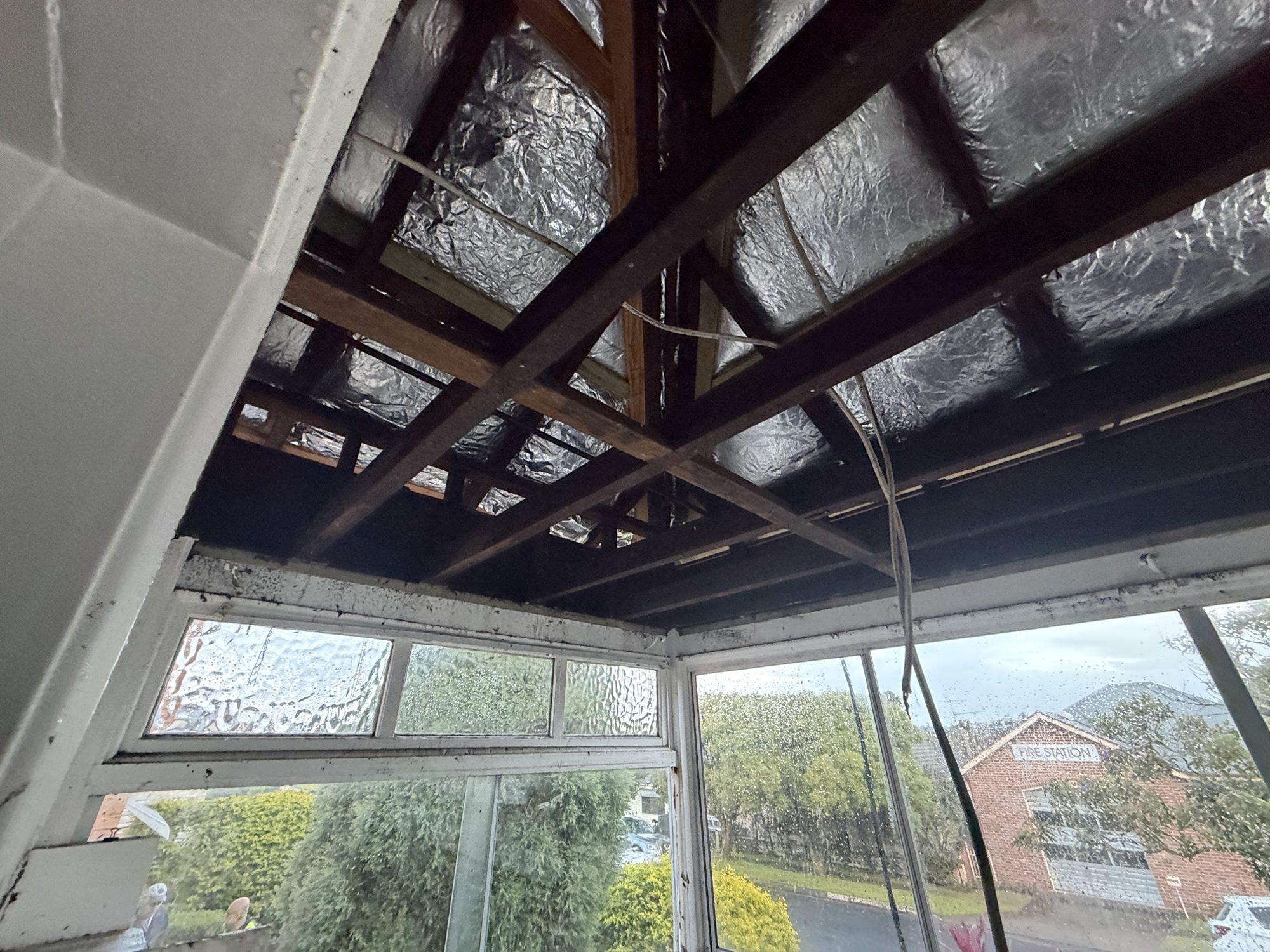 Interior of the house stripped back to framing during the soft strip