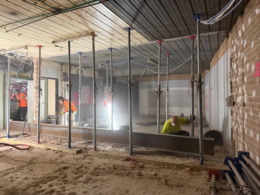 HazWreck crew on a commercial strip-out with propped ceiling and steel beams