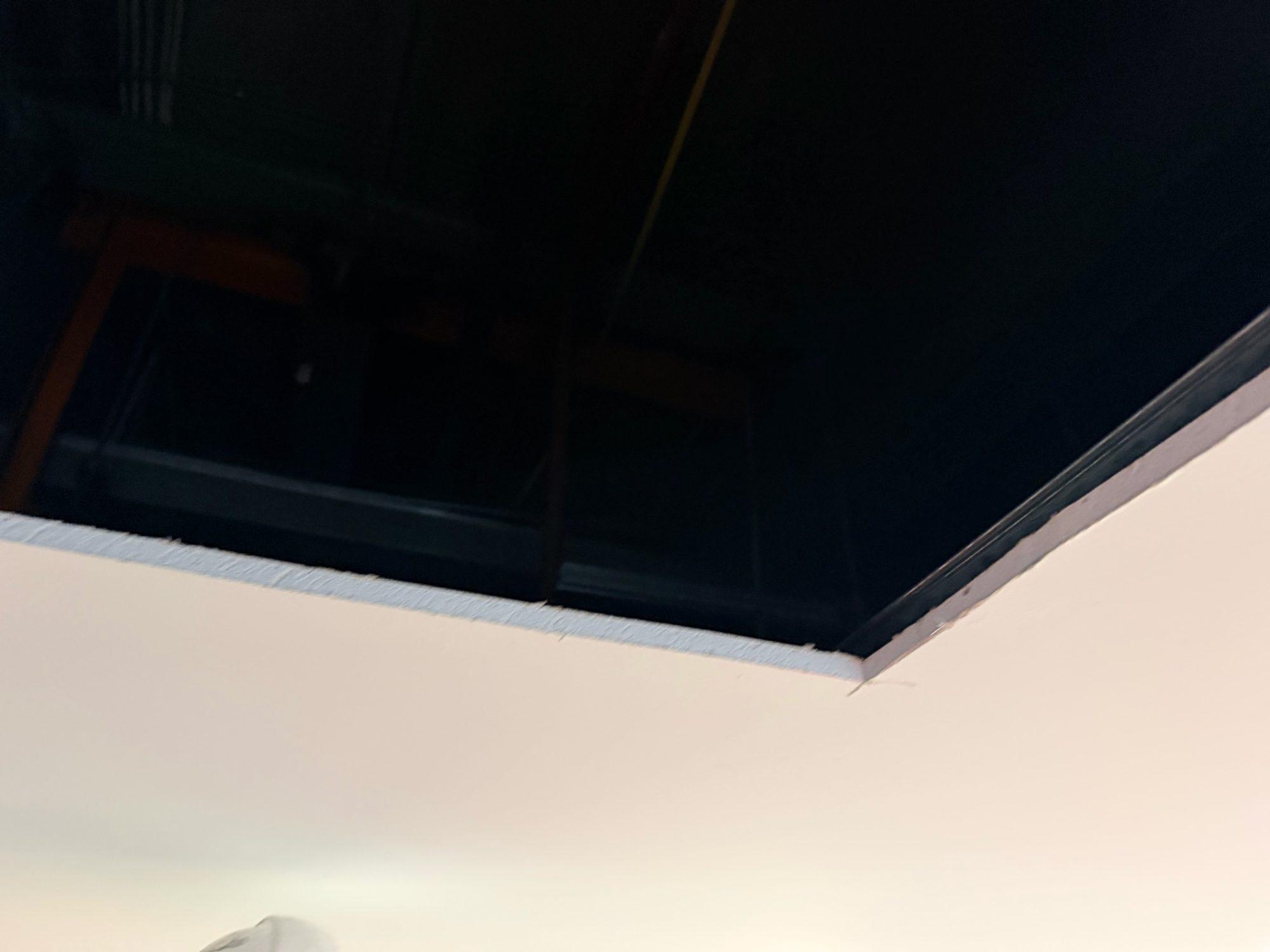 Completed rectangular access opening in a white plasterboard ceiling at Sydney Airport T1